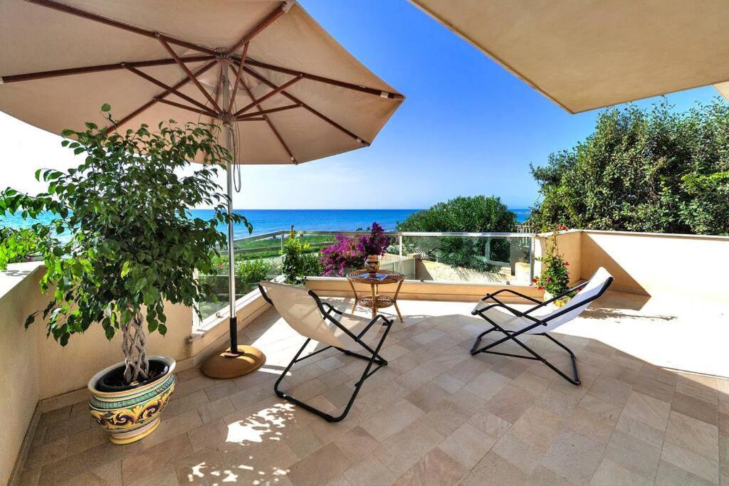 Cala Cuticchi, Sea Front, Wi-fi, Parking Holiday home *